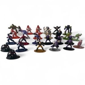 Small PVC collectible figurines (about 1.5–2 inches tall) on round bases.